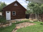 Small fenced back yard and garage